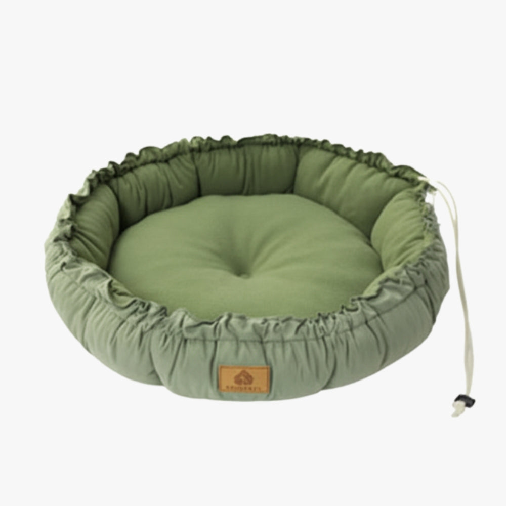 coussin-rond-pour-chien-vert-replie